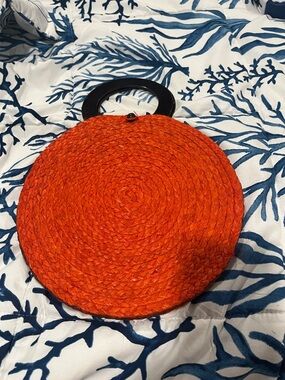 Majunca Bright Orange Round Woven  Bag with Black Handle
